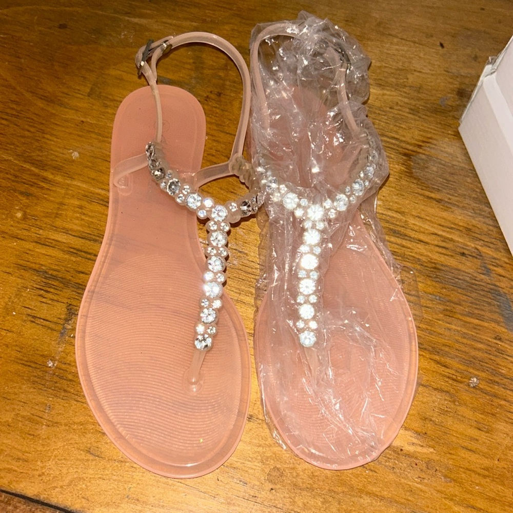 I am selling these jelly nude sandals with rhinestones.